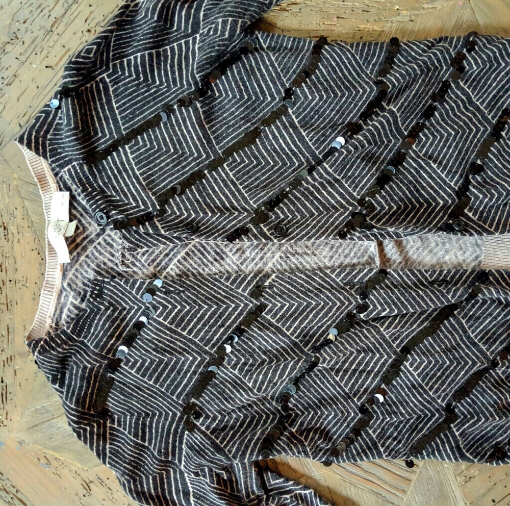 Striped and sequined cardigan.